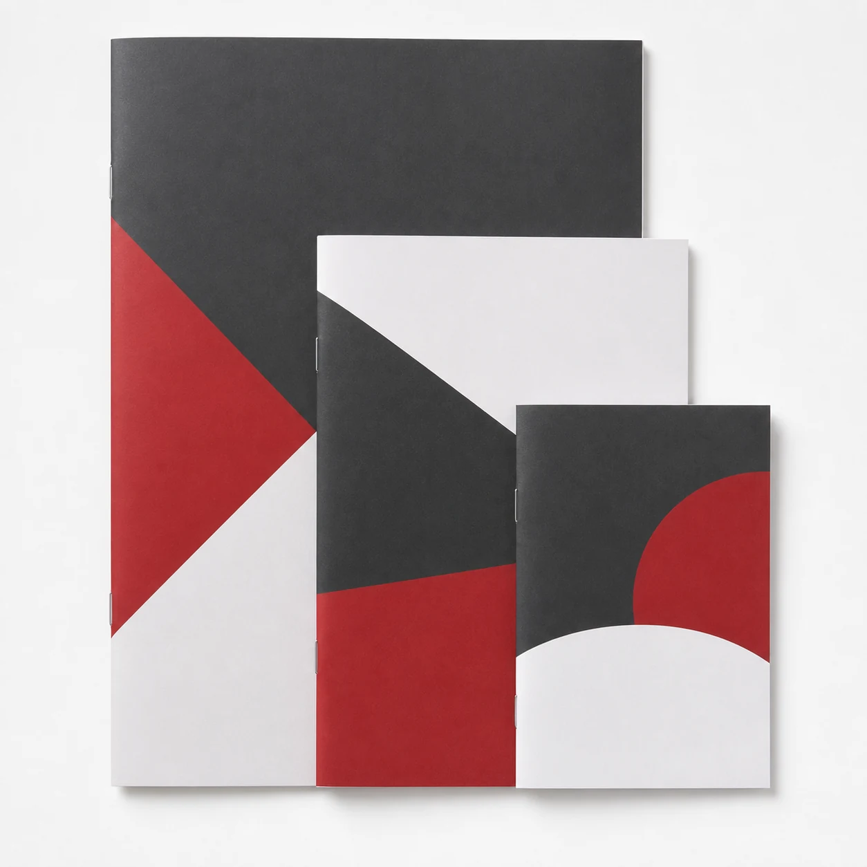 A6, A5 and A4 saddle-stitched booklet size comparison