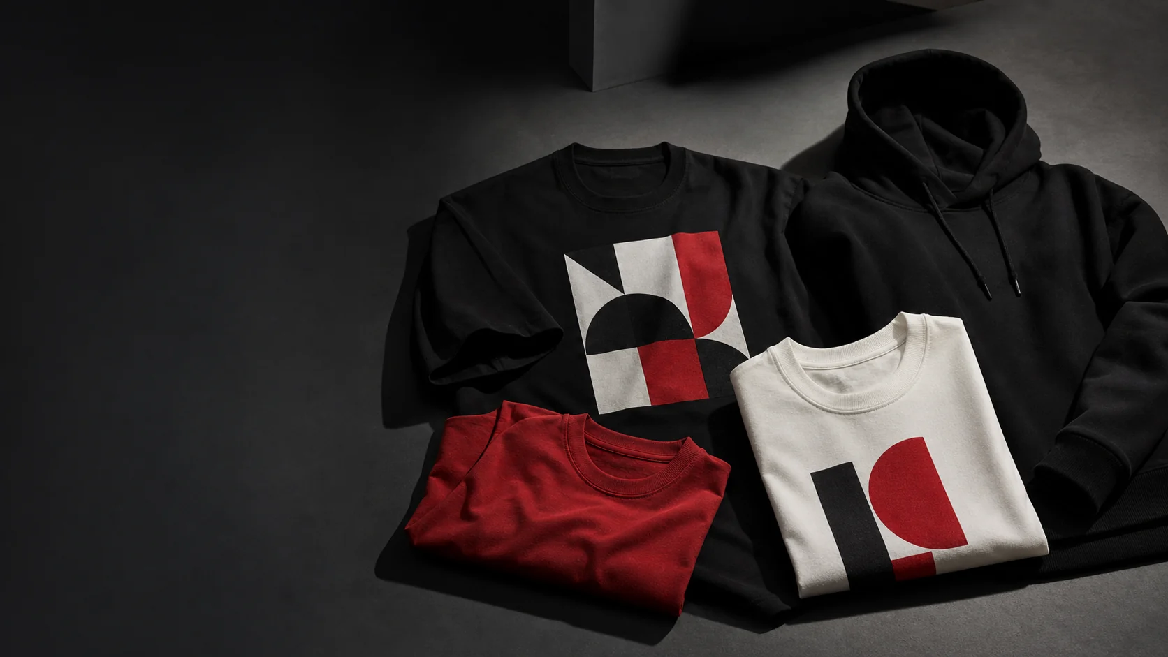 Custom printed T-shirts and hoodie arranged for an Auckland apparel printing project